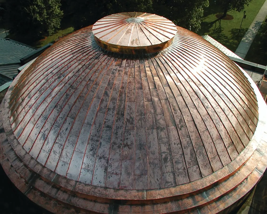 Craftsman Roofing crew installing a new roof in McFarland